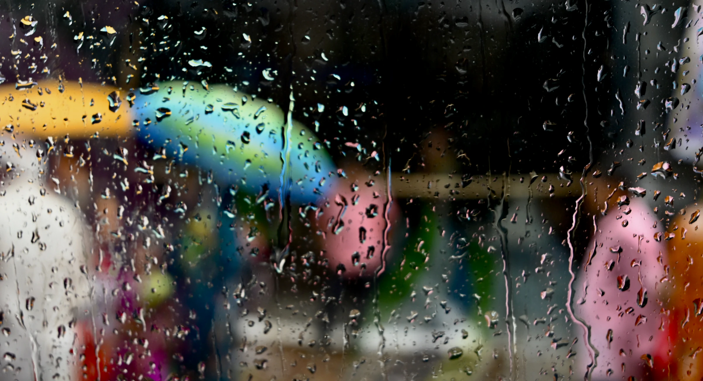 Mumbai monsoon rain over a high-rise balcony