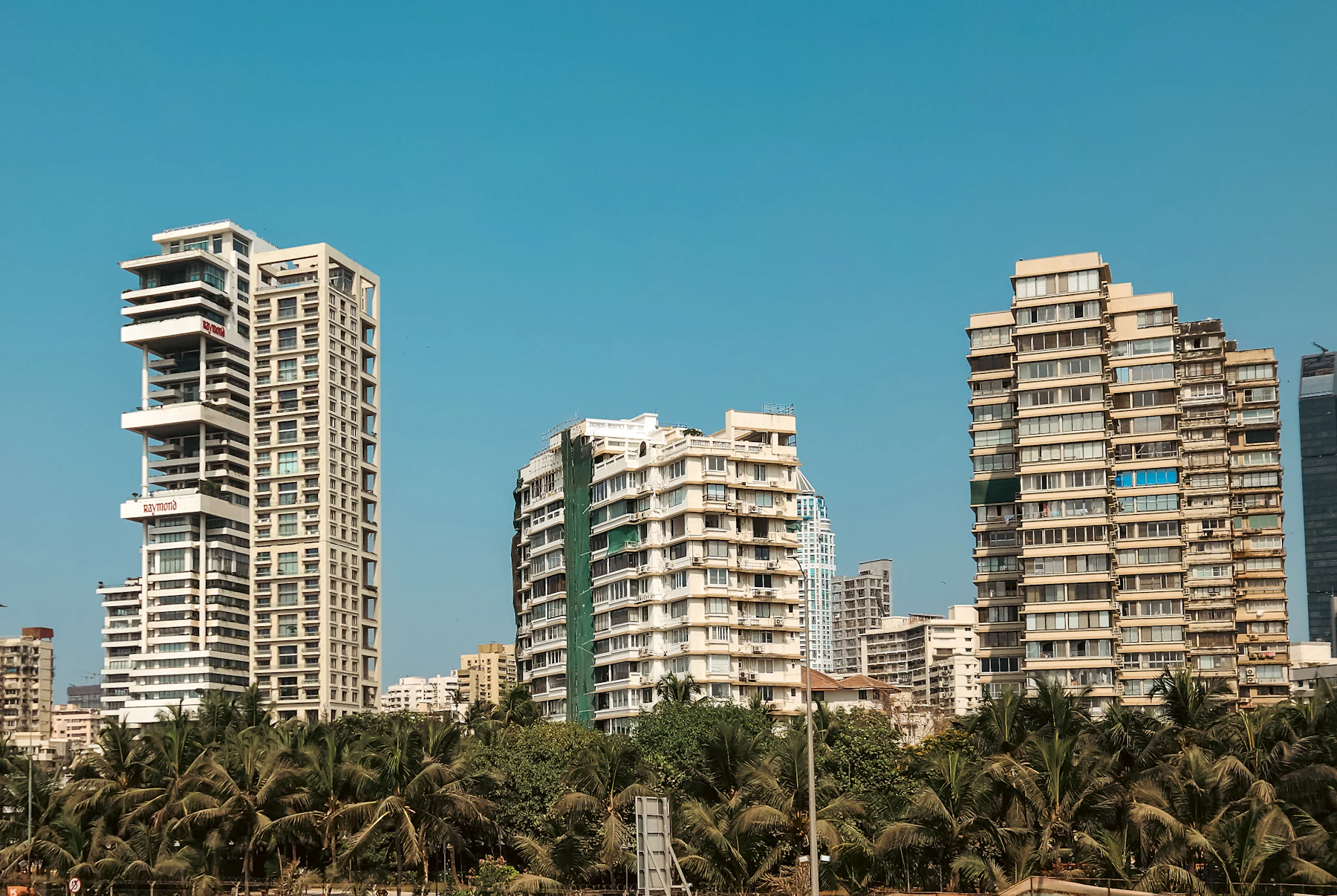 Mumbai sea-facing office tower at dusk