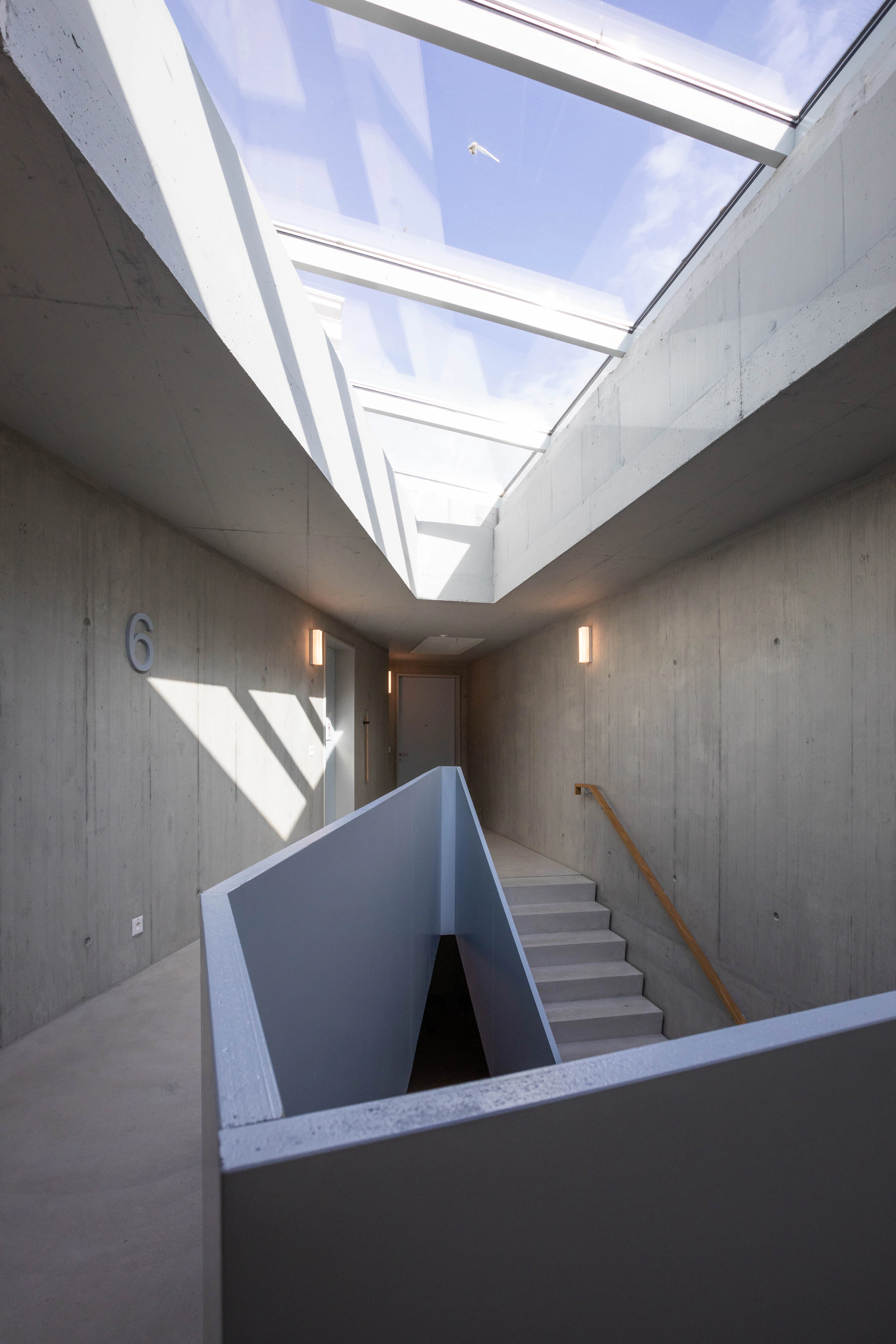 Frameless glass staircase railing in a contemporary home