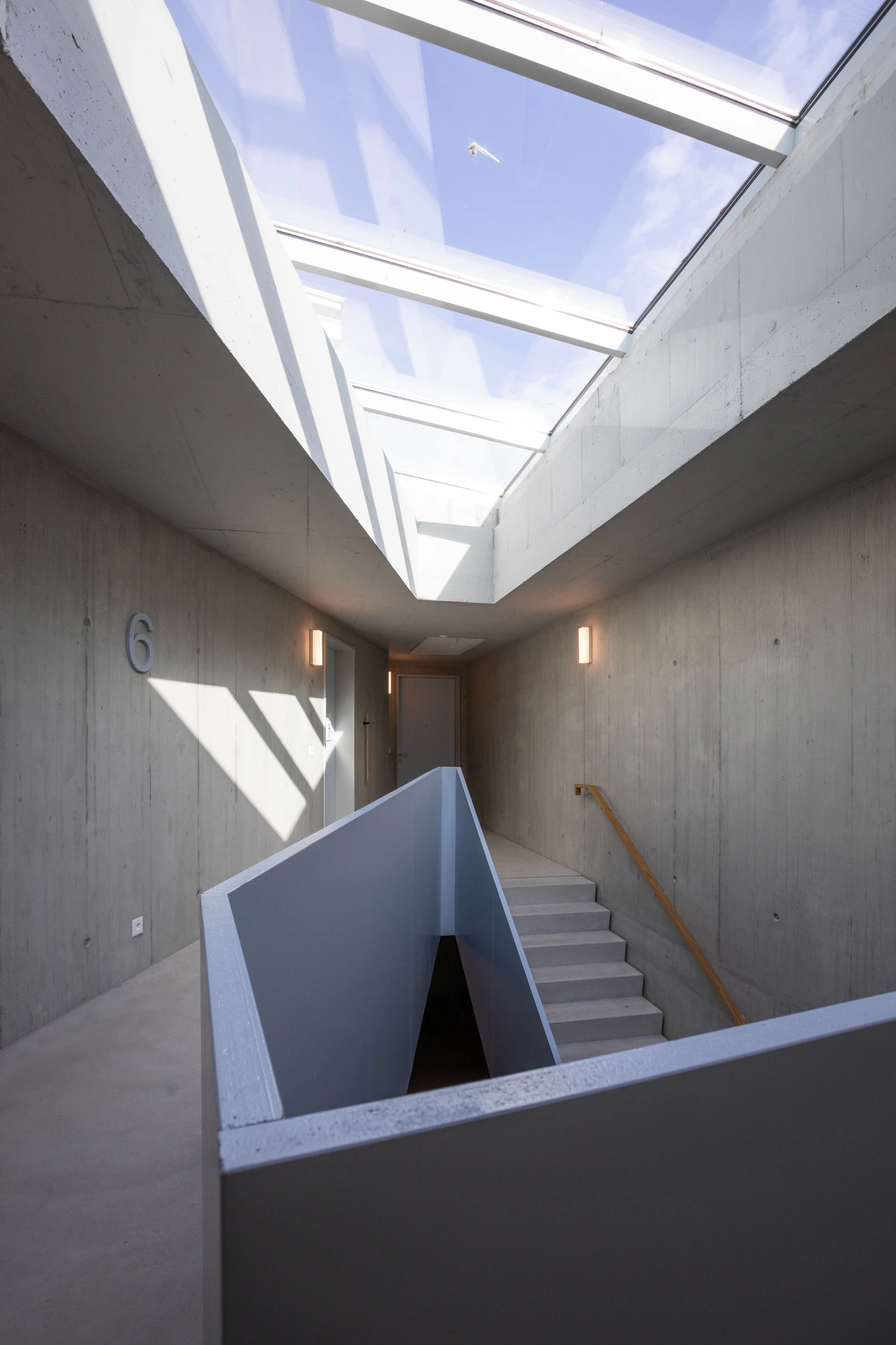 Frameless glass railing on a contemporary staircase