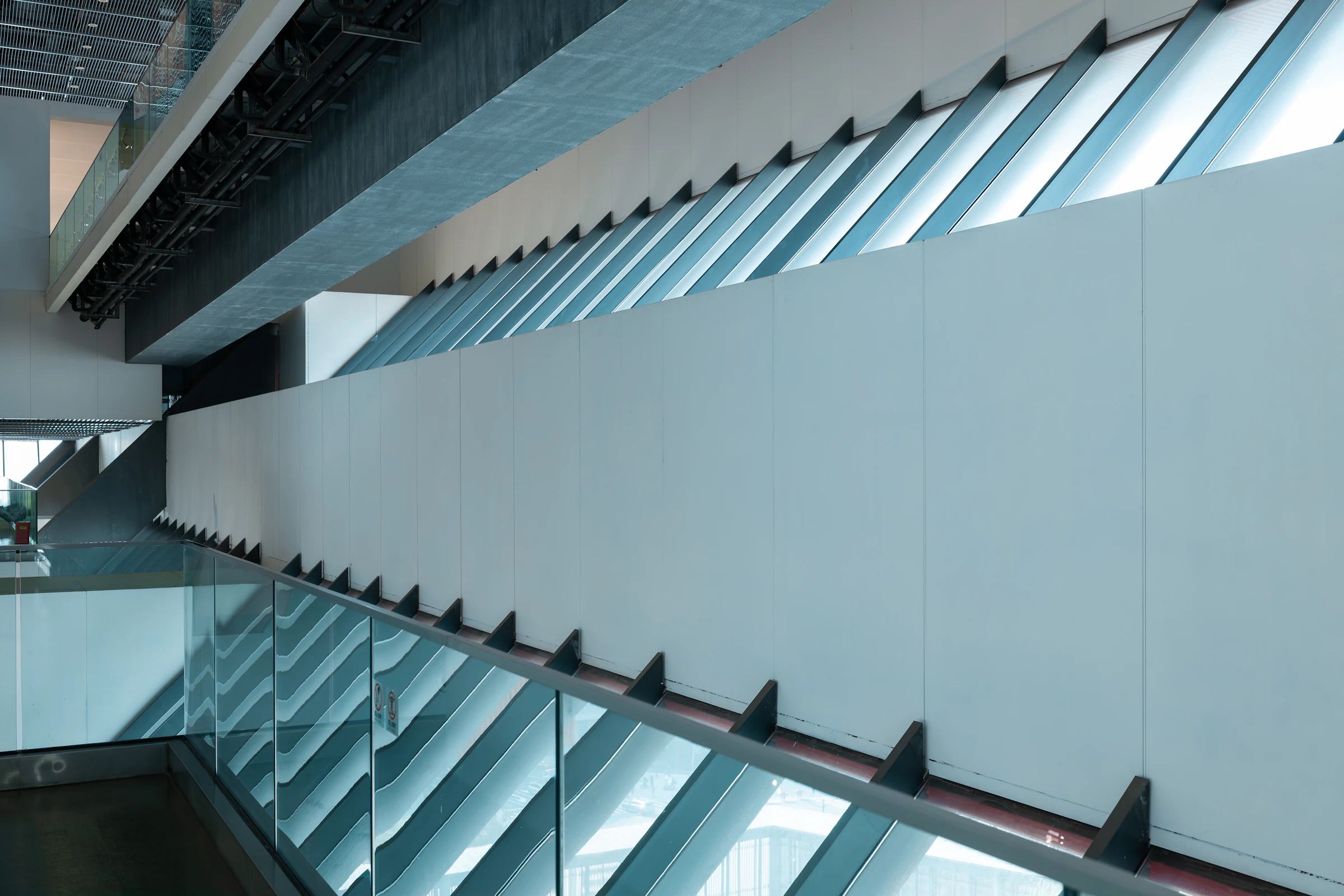 Modern bedroom with open window at dusk