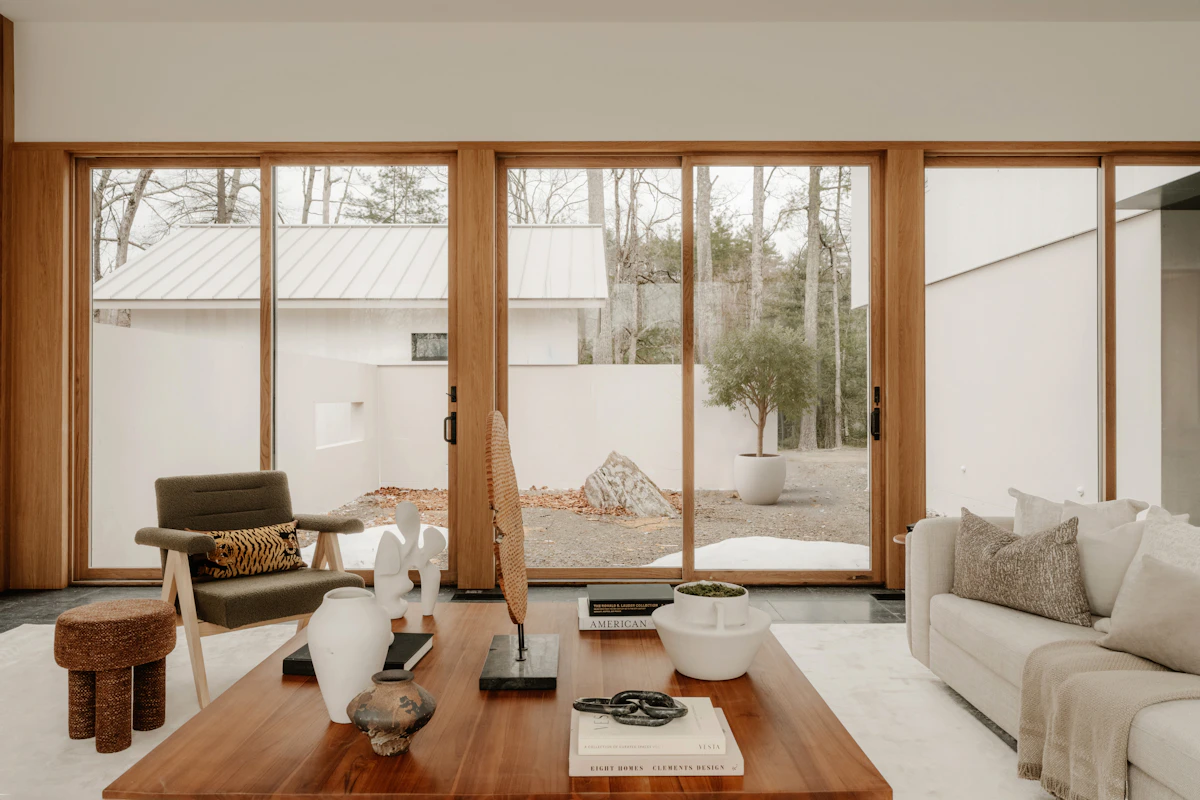 Indoor lounge with glass doors to pool deck
